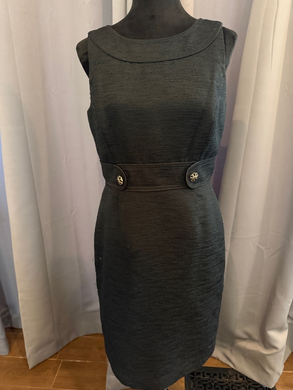 Classic Sleeveless Black Sheath Dress with Decorative Waist Buttons. Fully Lined